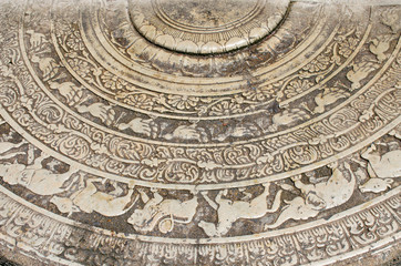 old ornament from a stone different animals