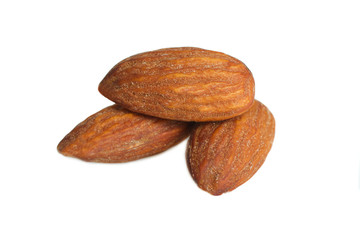 Three dried almond nuts