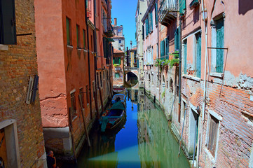 Fototapeta na wymiar Venetian canal detail in summer