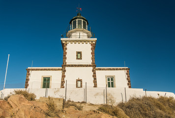 Akrotis Santorini, Greece - lighthouse for sighting at sunset