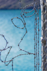 barbed wire fence for protection at Lake Coleridge, New Zealand