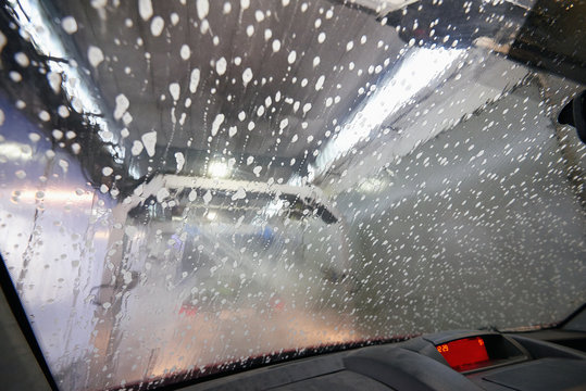 Automatic carwash tunnel station view from inside car