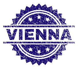 VIENNA stamp seal watermark with distress style. Blue vector rubber print of VIENNA tag with grunge texture.