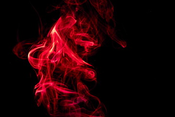 Fototapeta premium Red smoke on black background