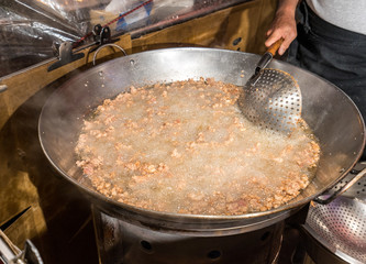 Fresh and delicious Taiwanese deep fried chicken (Salt crispy chicken) in Taiwan's night market, close up.