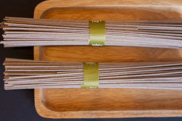 noodles on wooden board