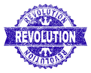 REVOLUTION rosette stamp seal overlay with grunge style. Designed with round rosette, ribbon and small crowns. Blue vector rubber watermark of REVOLUTION text with corroded style.