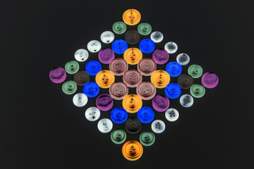 Collection of different buttons for clothes repair. Abstraction. Illustration. Set of colored buttons.