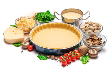 shortbread dough for baking quiche tart in baking form and ingredients