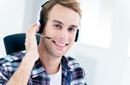 Portrait of customer support phone operator