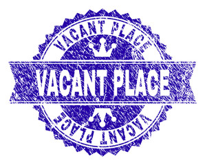 VACANT PLACE rosette seal imprint with grunge style. Designed with round rosette, ribbon and small crowns. Blue vector rubber watermark of VACANT PLACE text with grunge style.