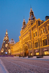 Christmas market on Red Square in Moscow. New year lights and ornaments next to GUM Moscow.