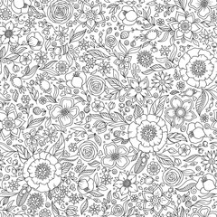 Seamless floral doodle background pattern in vector.