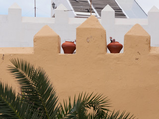 stone mound with flowerpots