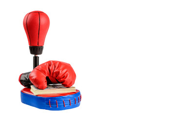 Red boxing gloves with dollar bills on a white background.