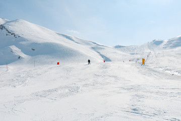 Fototapeta na wymiar Ski slope mountain skiing valley snow Italy, Europe