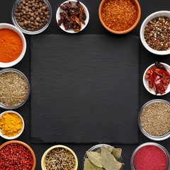 Assorted indian spices and herbs with space for text