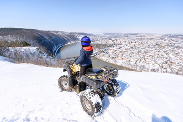 Travel in the winter on the ATV. Beautiful winter nature.