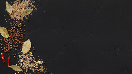 Dried bay leaves, spices and condiments, top view