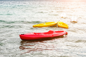 Colorful kayaks on the beach of the Vuligmeni Marine Lake