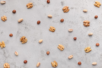 Nuts pattern. Walnuts, hazelnuts and pistachios, top view