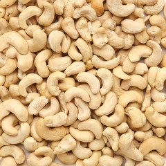Cashew nuts as food background, top view