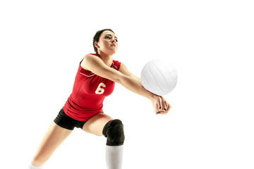 Female professional volleyball player isolated on white with ball. The athlete, exercise, action, sport, healthy lifestyle, training, fitness concept © master1305