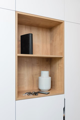 Wooden cabinet in entrance hall of modern house