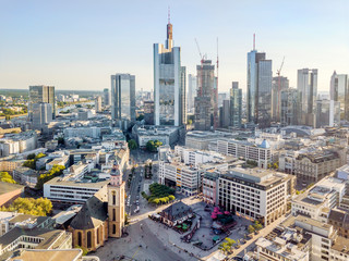 Modern downtown with skyscrapers and old Lutheran church in Frankfurt am Main, Germany