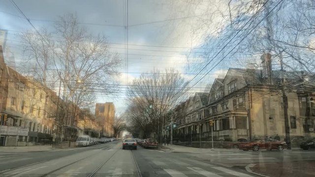 Drivelapse of car moving at sunset on South Philadelphia city timelapse hyperlapse 