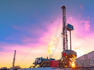 Drilling a deep well with a drilling rig in an oil and gas field. The field is located in the Far...