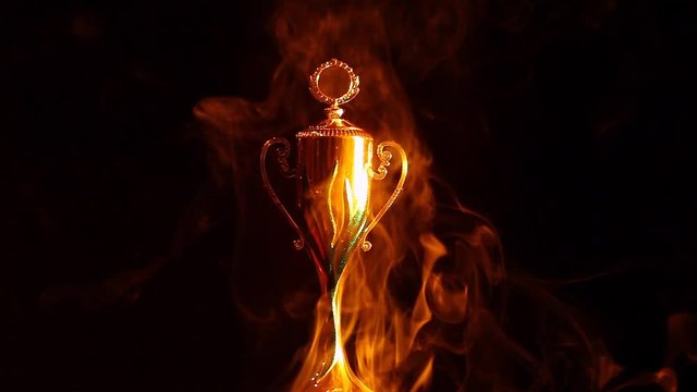 gold cup smoke dark background hd footage 