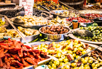 Close up of several baskets of Tarallucci with spices, like Saffron. Savory biscuits typical of southern Italy. Horizontal view