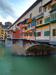 Fototapeta na wymiar View of the colorful western side of Ponte Vecchio, Florence, Italy