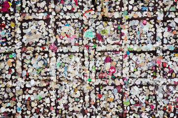 Close up of the message board at the entrance to the Giulietta house in Verona. Full of little love messages written on sticky paper. Concept of loyalty in love.