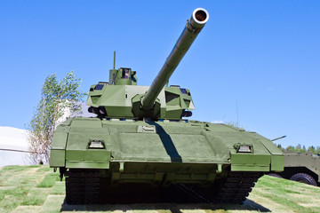 Fototapeta premium T-14 Armata tank at the military exhibition. Proud tank against the sky.