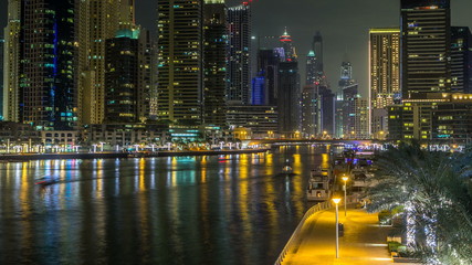 Promenade in Dubai Marina timelapse at night, UAE. Top view