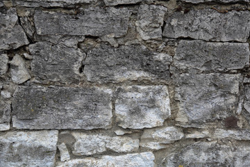 Original textured surface of of a natural coarse stone