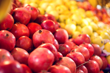 Organic, fresh, red garnet for sale at a local market