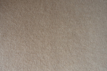 Basic beige knitted fabric made with stocking stitch