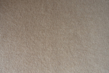 Basic beige knitted fabric made with stocking stitch