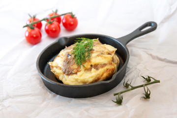 Dish made with cooked duck meat, dehydrated potato, fresh cream of mushroom and cheese