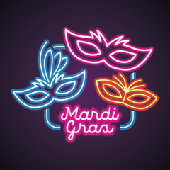 mardi gras for mask carnival with neon light effect. vector illustration © hanahu