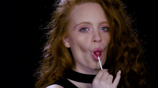 sexy redhead licking and sucking