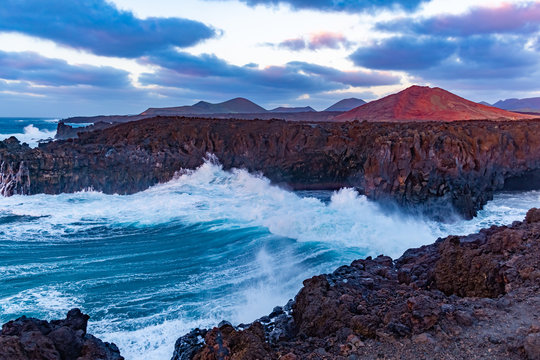Amazing Los Hervideros lava caves in Lanzarote island at sunset, popular touristic attraction, Canary Islands, Spain © pszabo