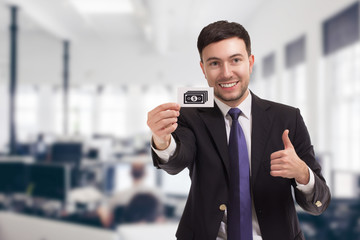 Business, technology, internet and networking concept. Young entrepreneur showing keyword: