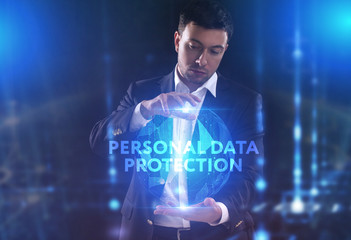 The concept of business, technology, the Internet and the network. A young entrepreneur working on a virtual screen of the future and sees the inscription: Personal data protection