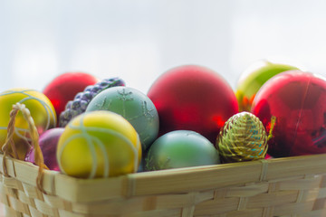 a lot of Christmas toys in a wicker basket