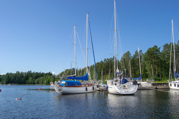 Fototapeta na wymiar Landscape of a lake with boats in Kuopio