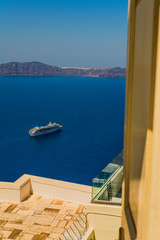 Fototapeta premium Santorini Fira, Greece - landscape with boat